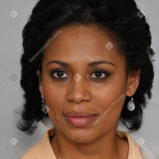 Joyful black adult female with medium  brown hair and brown eyes