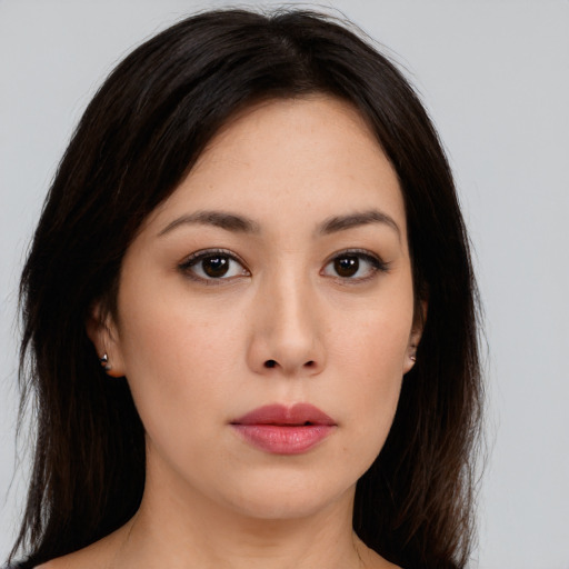 Neutral asian young-adult female with medium  brown hair and brown eyes