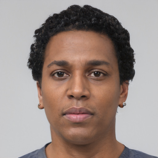 Neutral black young-adult male with short  black hair and brown eyes