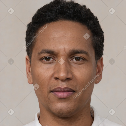 Neutral latino adult male with short  black hair and brown eyes