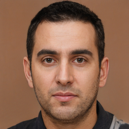 Neutral white young-adult male with short  brown hair and brown eyes
