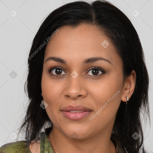 Joyful latino young-adult female with medium  brown hair and brown eyes