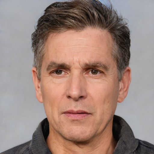 Neutral white middle-aged male with short  brown hair and brown eyes