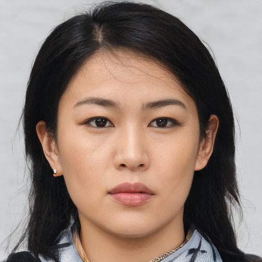 Neutral asian young-adult female with medium  black hair and brown eyes