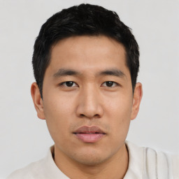 Neutral asian young-adult male with short  black hair and brown eyes