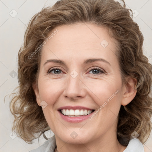 Joyful white young-adult female with medium  brown hair and green eyes