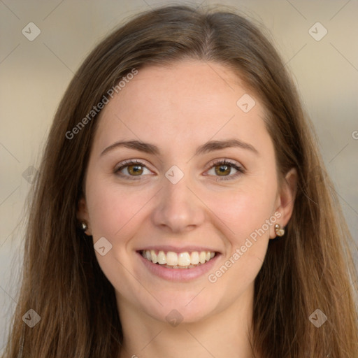 Joyful white young-adult female with long  brown hair and green eyes