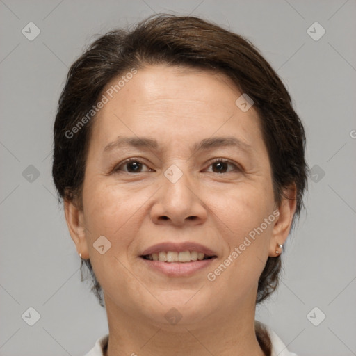 Joyful white adult female with short  brown hair and brown eyes