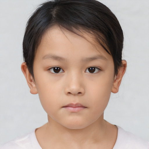 Neutral asian child female with short  brown hair and brown eyes
