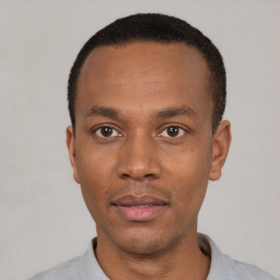 Neutral black young-adult male with short  black hair and brown eyes
