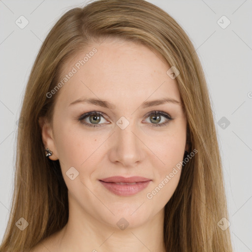 Joyful white young-adult female with long  brown hair and green eyes