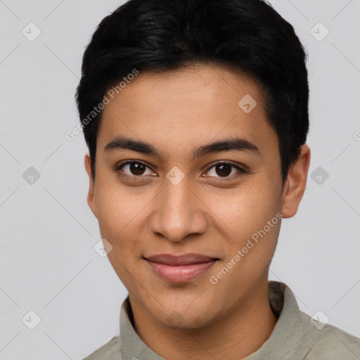 Joyful asian young-adult male with short  black hair and brown eyes