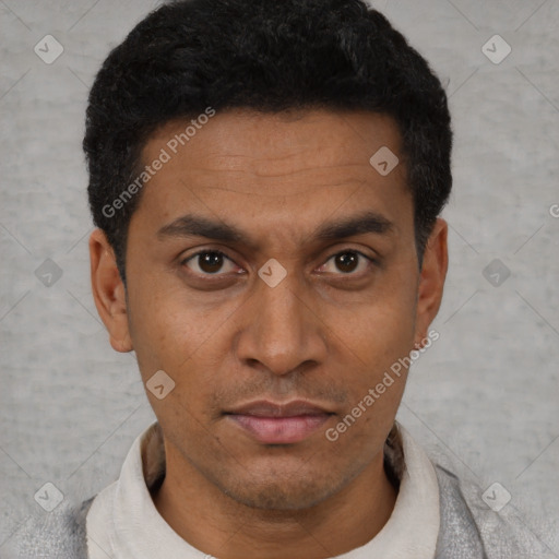 Neutral latino young-adult male with short  black hair and brown eyes