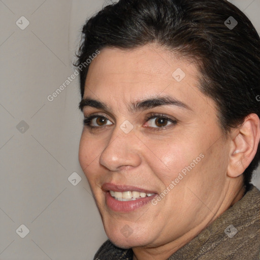 Joyful white adult female with short  brown hair and brown eyes