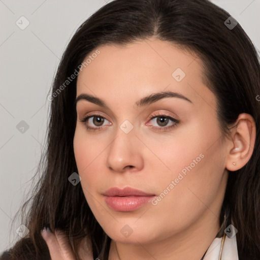 Neutral white young-adult female with long  brown hair and brown eyes