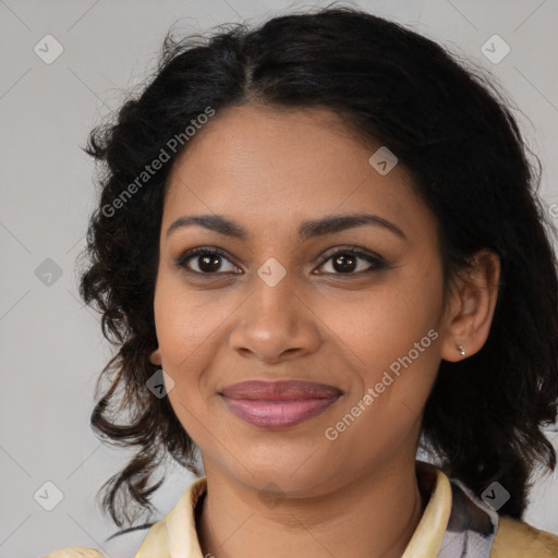 Joyful black young-adult female with medium  brown hair and brown eyes