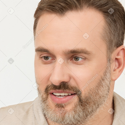 Joyful white adult male with short  brown hair and brown eyes