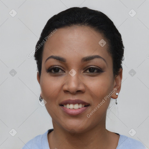 Joyful black young-adult female with short  black hair and brown eyes