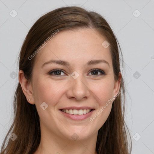 Joyful white young-adult female with long  brown hair and grey eyes