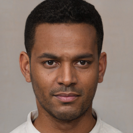 Neutral black young-adult male with short  black hair and brown eyes
