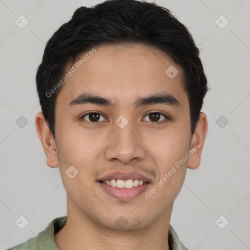 Joyful asian young-adult male with short  brown hair and brown eyes