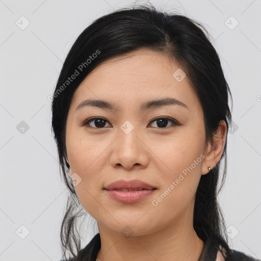 Joyful asian young-adult female with medium  black hair and brown eyes