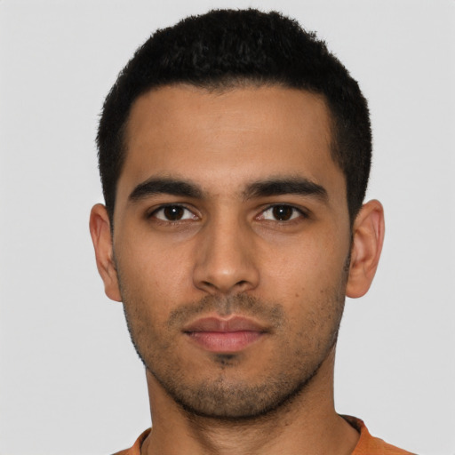 Neutral latino young-adult male with short  black hair and brown eyes