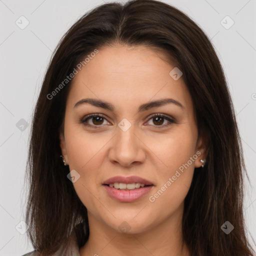 Joyful white young-adult female with long  brown hair and brown eyes