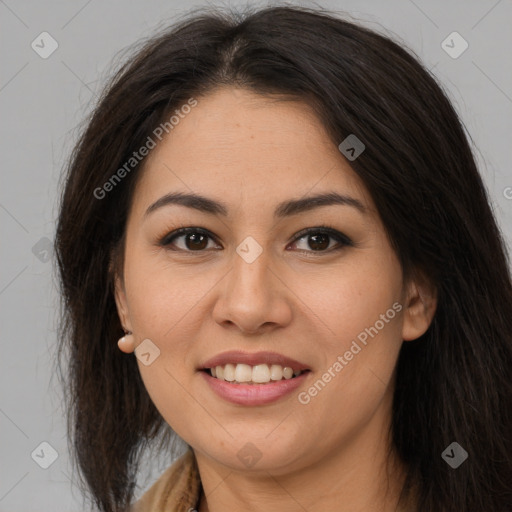 Joyful latino young-adult female with long  brown hair and brown eyes