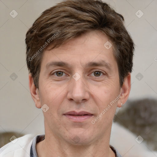 Joyful white adult male with short  brown hair and grey eyes