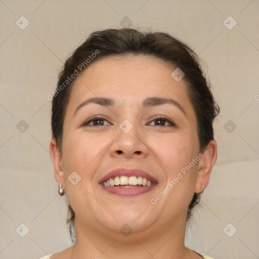 Joyful white adult female with short  brown hair and brown eyes