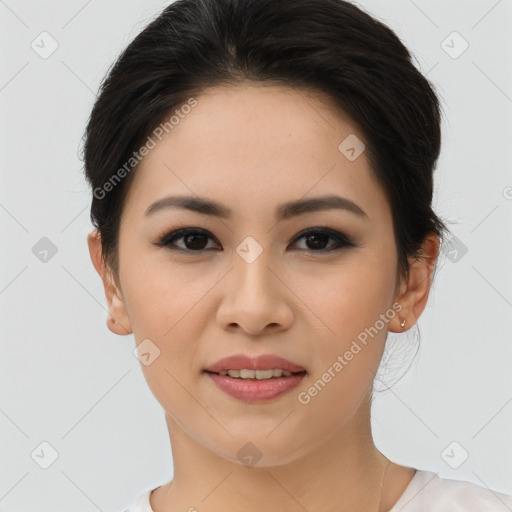 Joyful asian young-adult female with short  brown hair and brown eyes