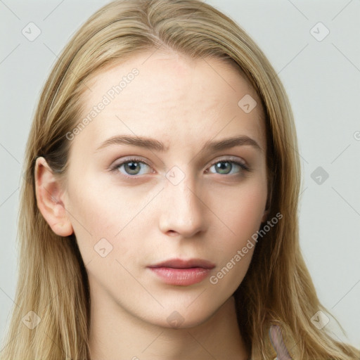 Neutral white young-adult female with long  brown hair and blue eyes