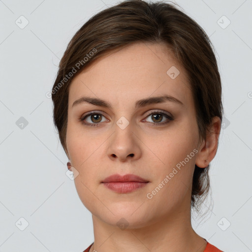 Neutral white young-adult female with short  brown hair and grey eyes