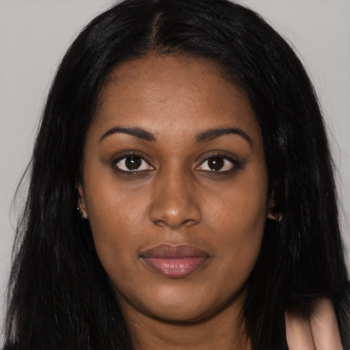 Joyful asian young-adult female with long  black hair and brown eyes