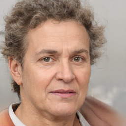 Joyful white middle-aged male with short  brown hair and brown eyes