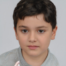 Neutral white child male with short  brown hair and brown eyes