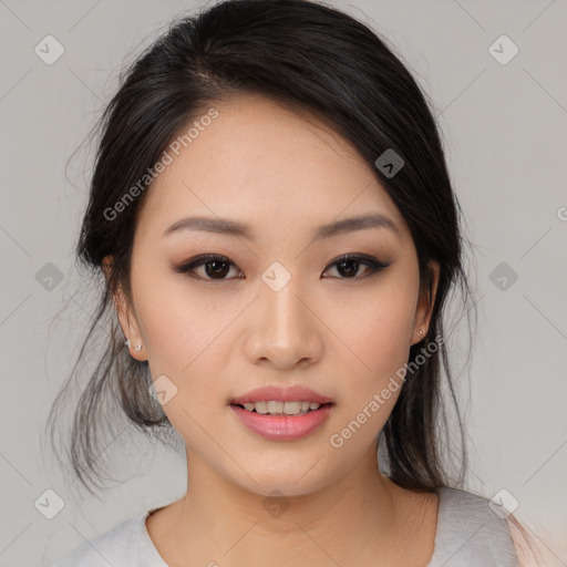 Joyful asian young-adult female with medium  black hair and brown eyes