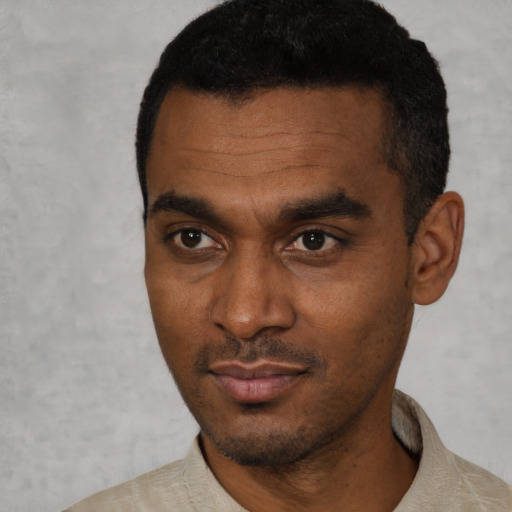 Neutral black young-adult male with short  black hair and brown eyes