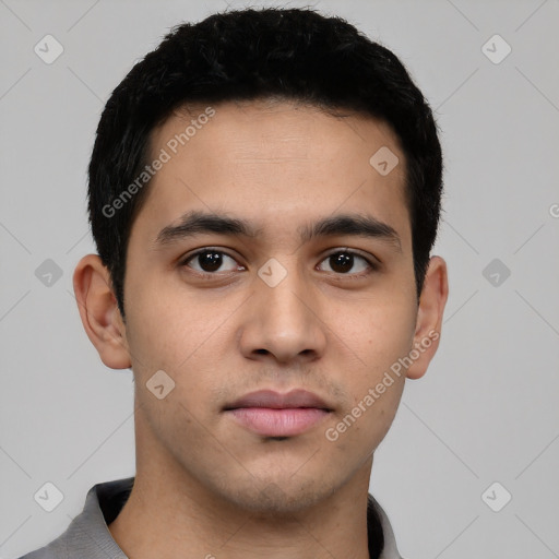 Neutral latino young-adult male with short  black hair and brown eyes