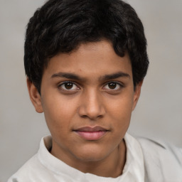 Joyful latino young-adult male with short  brown hair and brown eyes