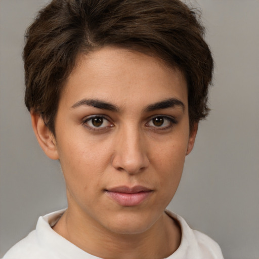 Neutral white young-adult female with short  brown hair and brown eyes