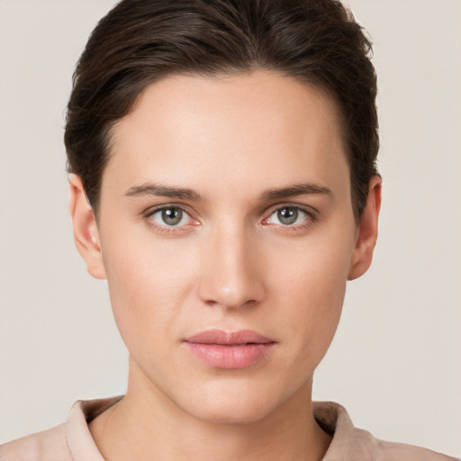 Neutral white young-adult female with short  brown hair and brown eyes