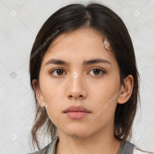 Neutral white young-adult female with medium  brown hair and brown eyes