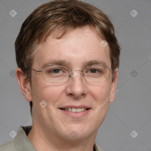 Joyful white adult male with short  brown hair and grey eyes