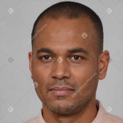Neutral latino adult male with short  brown hair and brown eyes