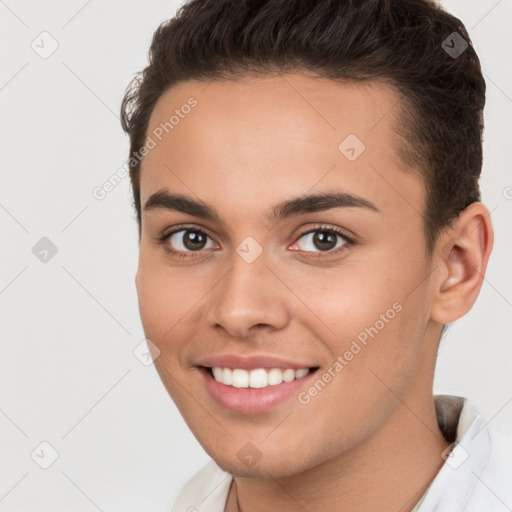 Joyful white young-adult female with short  brown hair and brown eyes