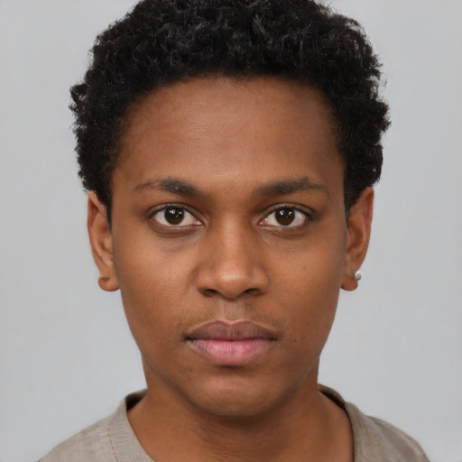 Neutral black young-adult male with short  brown hair and brown eyes