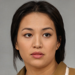 Neutral asian young-adult female with medium  brown hair and brown eyes