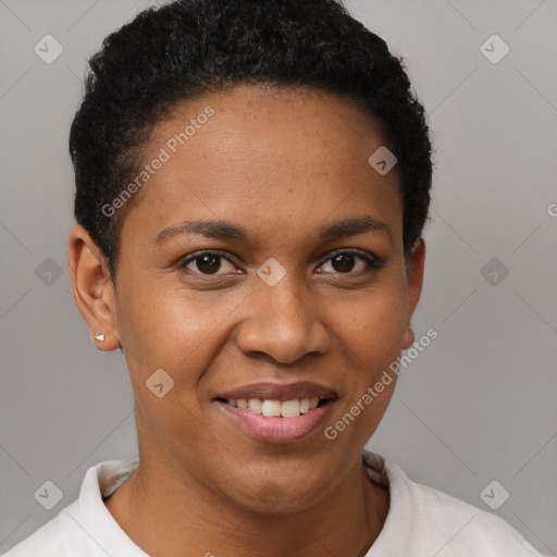 Joyful black young-adult female with short  black hair and brown eyes